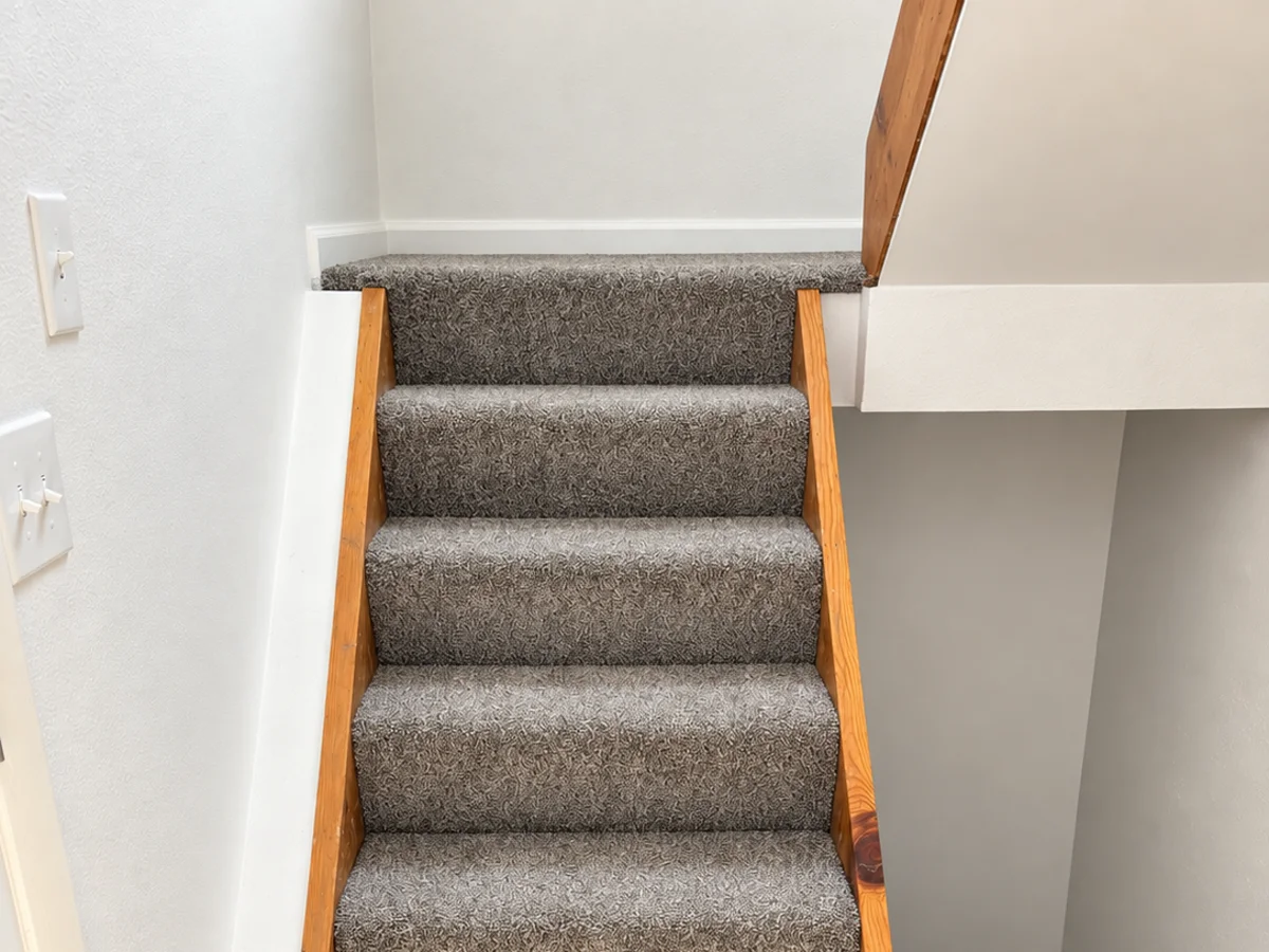 Why some homeowners choose carpet over hardwood on stairs