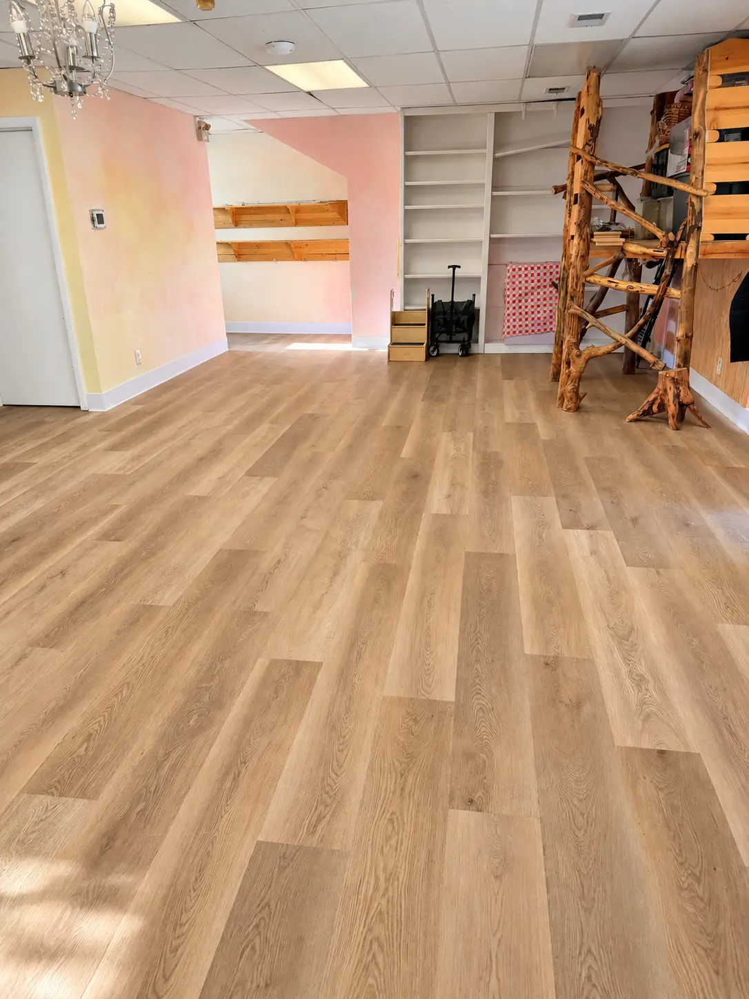 Oak-look luxury vinyl plank in a playroom