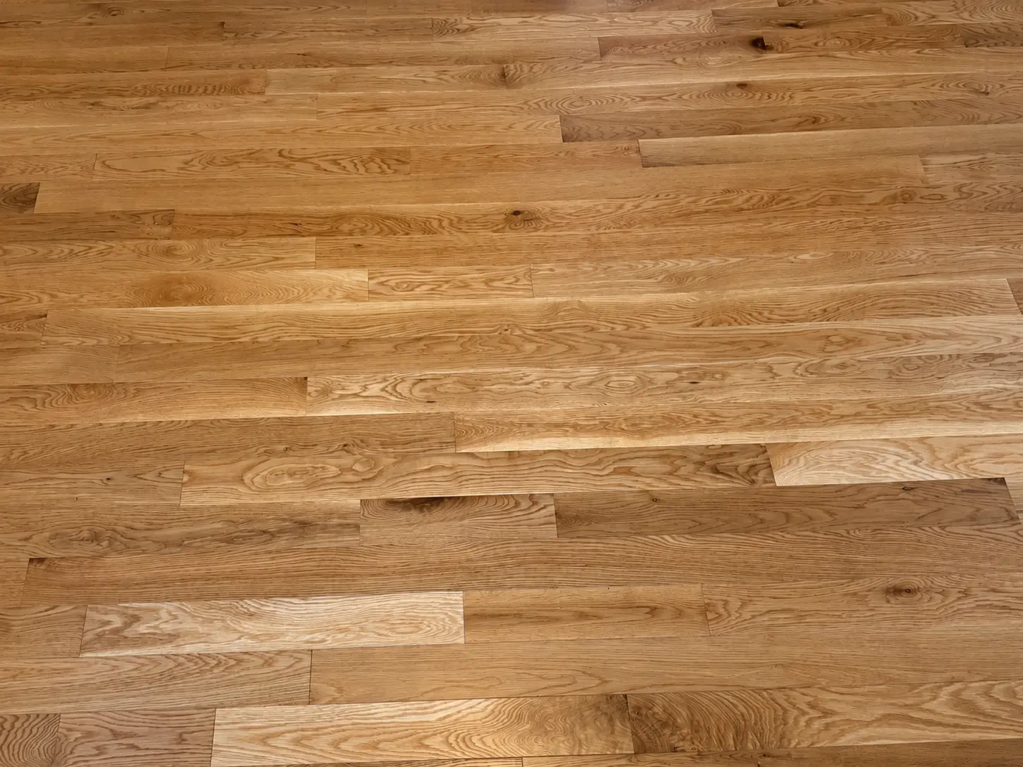 Close-up of freshly finished red oak planks